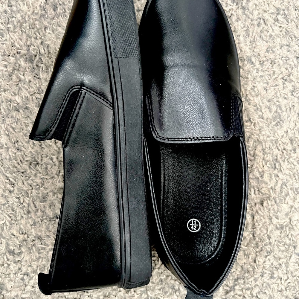 Faux leather loafers. Never worn!! Size 11, but fits like a 10!